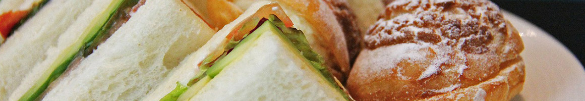 Eating Sandwich at Sandwich Plus restaurant in Anaheim, CA.